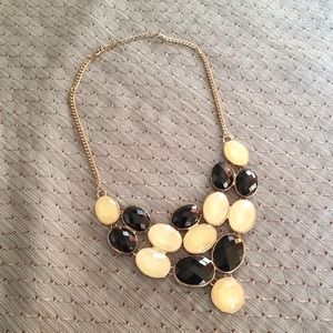 Gold Tone Bib Style Cascade Necklace with Black & Cream Beads